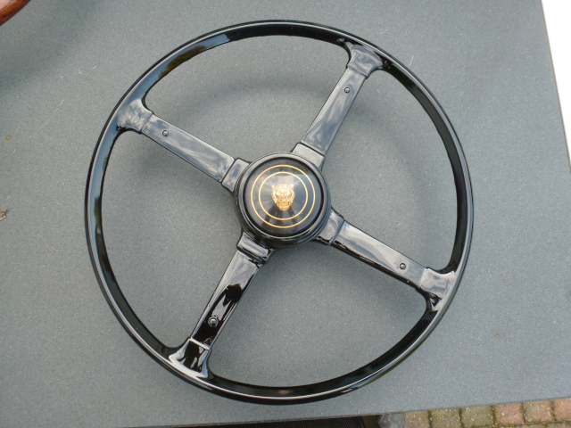 Restored steering wheel where the plastic has been replaced by epoxy