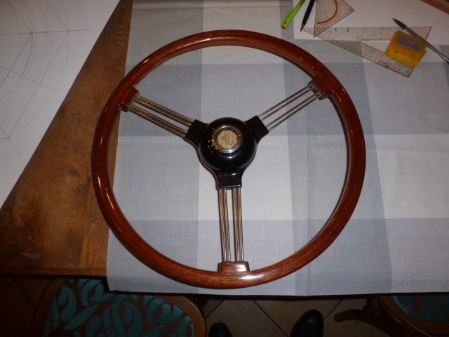 During restoration, the black hub will be painted and the spokes polished