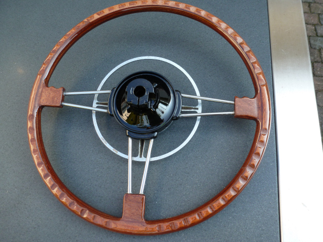 During restoration, the black hub will be painted and the spokes polished