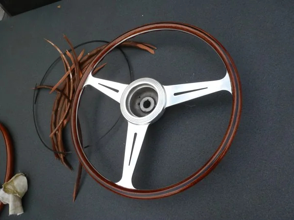 Alfa Romeo 2600 Nardi classic steering wheel restoration beside original wood remains