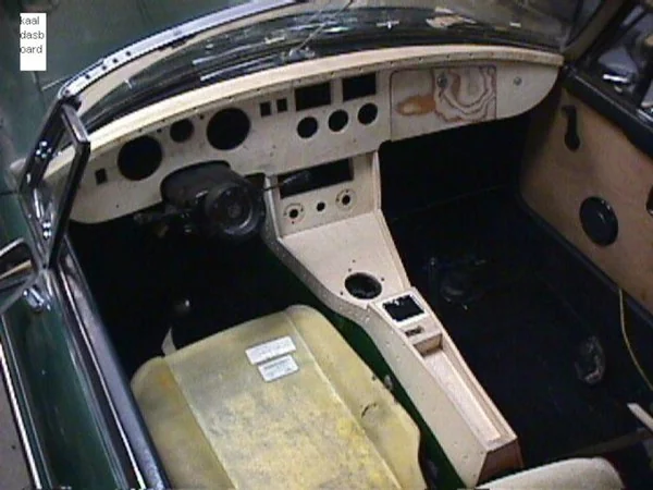 MGB dashboard and center console before veneer application during restoration