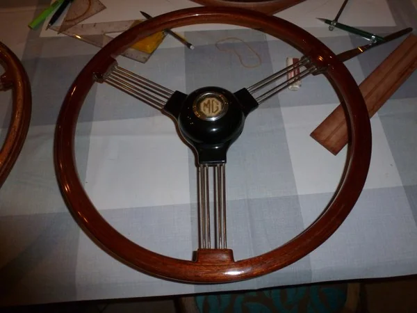 MG TD restored wooden steering wheel using circular wrapping method with mahogany slats