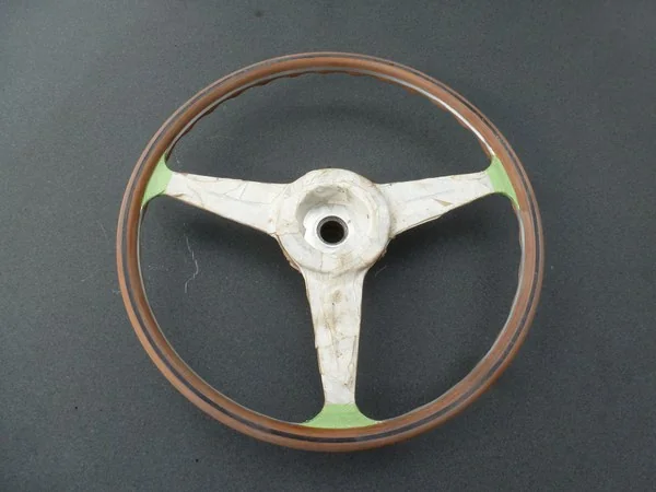 Porsche 356 Nardi steering wheel with old clear coat fully removed during restoration